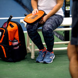 Pickleball Paddle Cover Orange Lifestyle - pickleball paddle case - best pickleball paddle cover - onix pickleball paddle covers