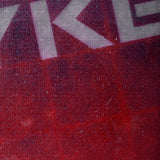 red close up texture of stryker 4 pickleball paddle