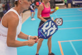 ONIX Supercell 22mm Pickleball Paddle, lifestyle photo, woman getting ready for a serve