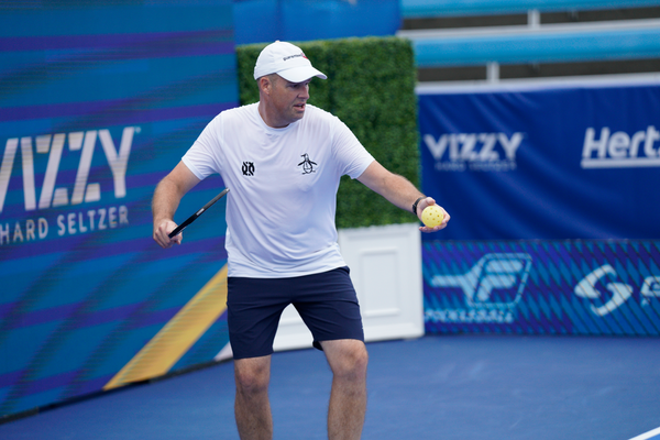 pickleball player matt wright serving a pickleball