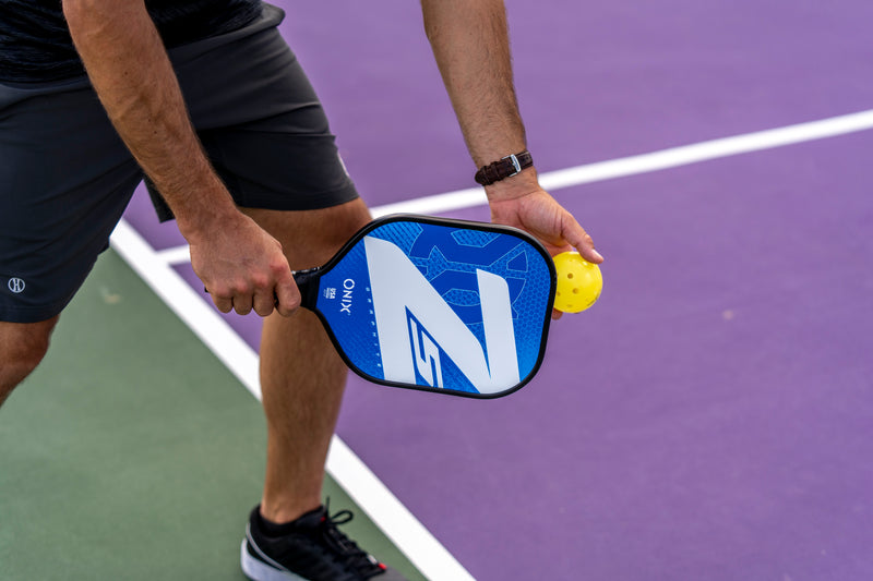 Z5 Mod V2 Series Graphite Paddle serving lifestyle blue