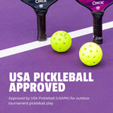 Two pickleball paddles and two balls on a purple surface with 'USA Pickleball Approved' text.