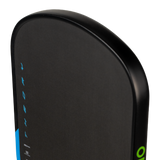 Close-up of the curved top edge of a black paddle board with blue and green branding details on a white background.
