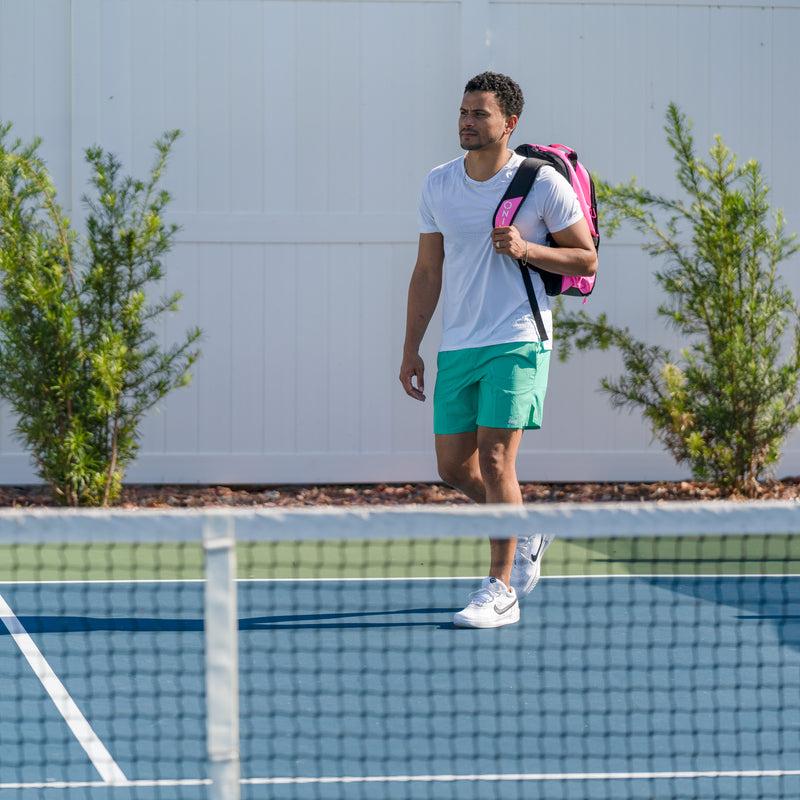 ONIX Pink Pro Team Backpack Pickleball Bag on guys back